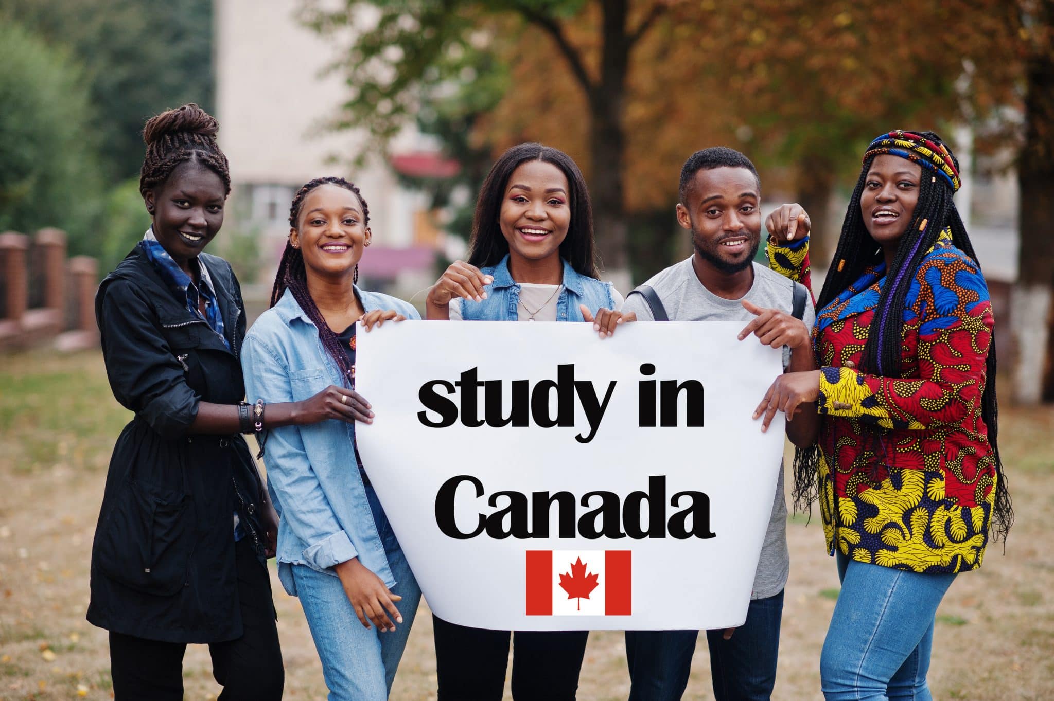 Study in Canada. Group of five african college students on campus at university yard hold white blank. Abroad countries for student concept. Par AS Photo Family