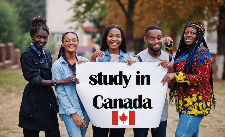 Study in Canada. Group of five african college students on campus at university yard hold white blank. Abroad countries for student concept. Par AS Photo Family